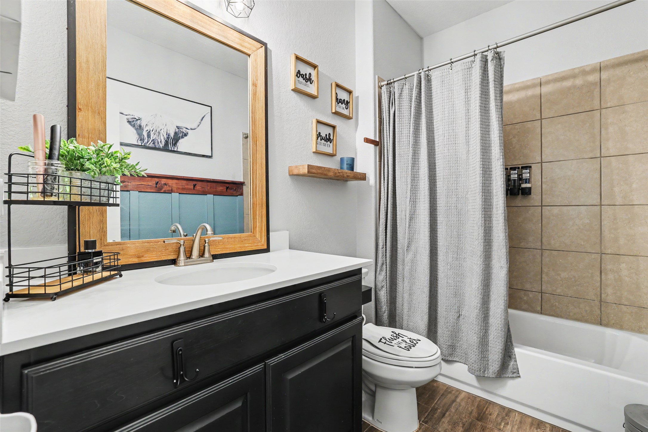 117 Rock Dock Road Georgetown, TX 78633 - Photo 31 of 38 a bathroom with a sink a toilet and shower