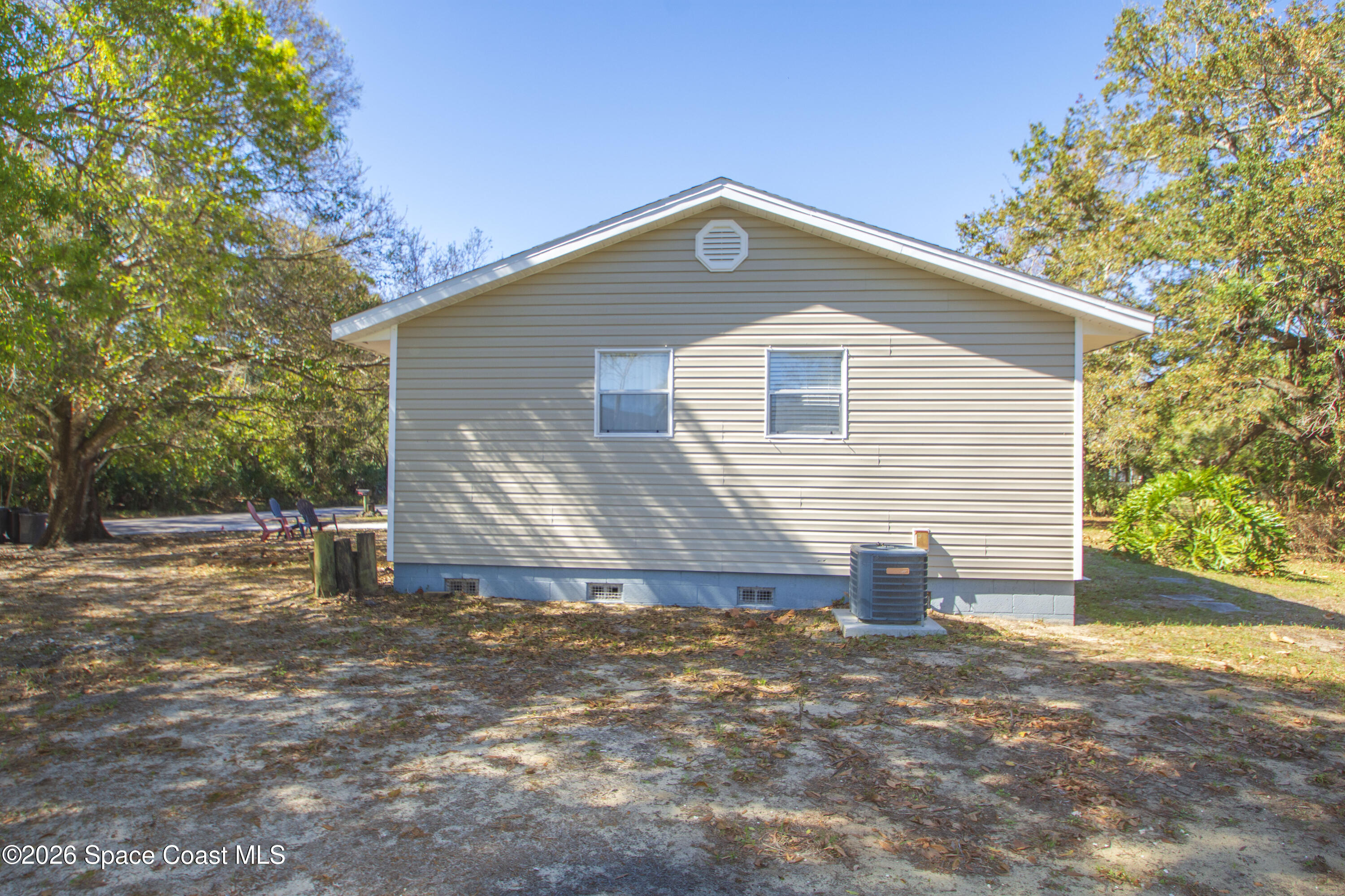 117 Acorn Terrace Sebastian, FL 32958 - Photo 13 of 33 a front view of a house with a yard
