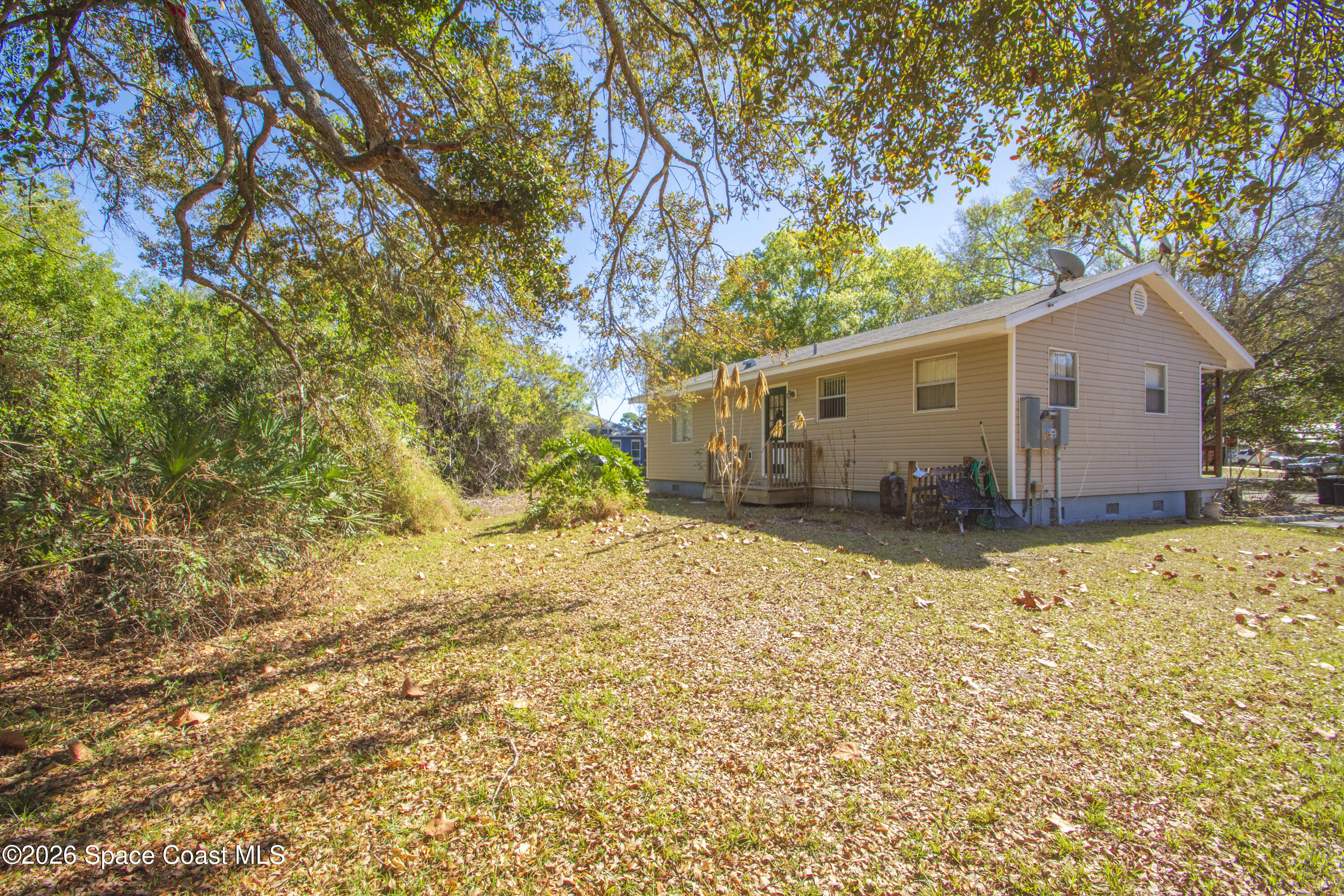 117 Acorn Terrace Sebastian, FL 32958 - Photo 14 of 33 a view of a backyard of the house