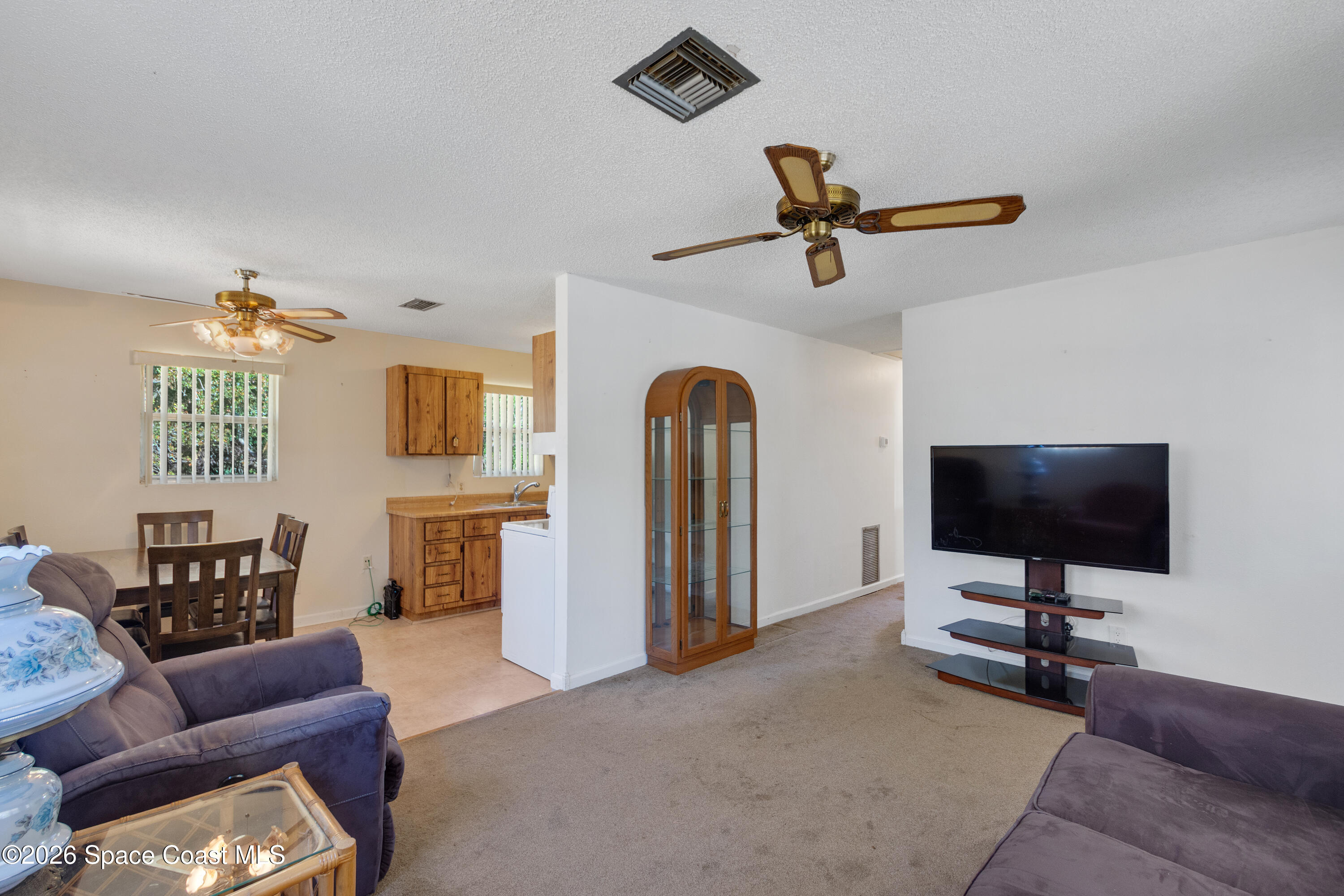117 Acorn Terrace Sebastian, FL 32958 - Photo 19 of 33 a view of livingroom with furniture and ceiling fan
