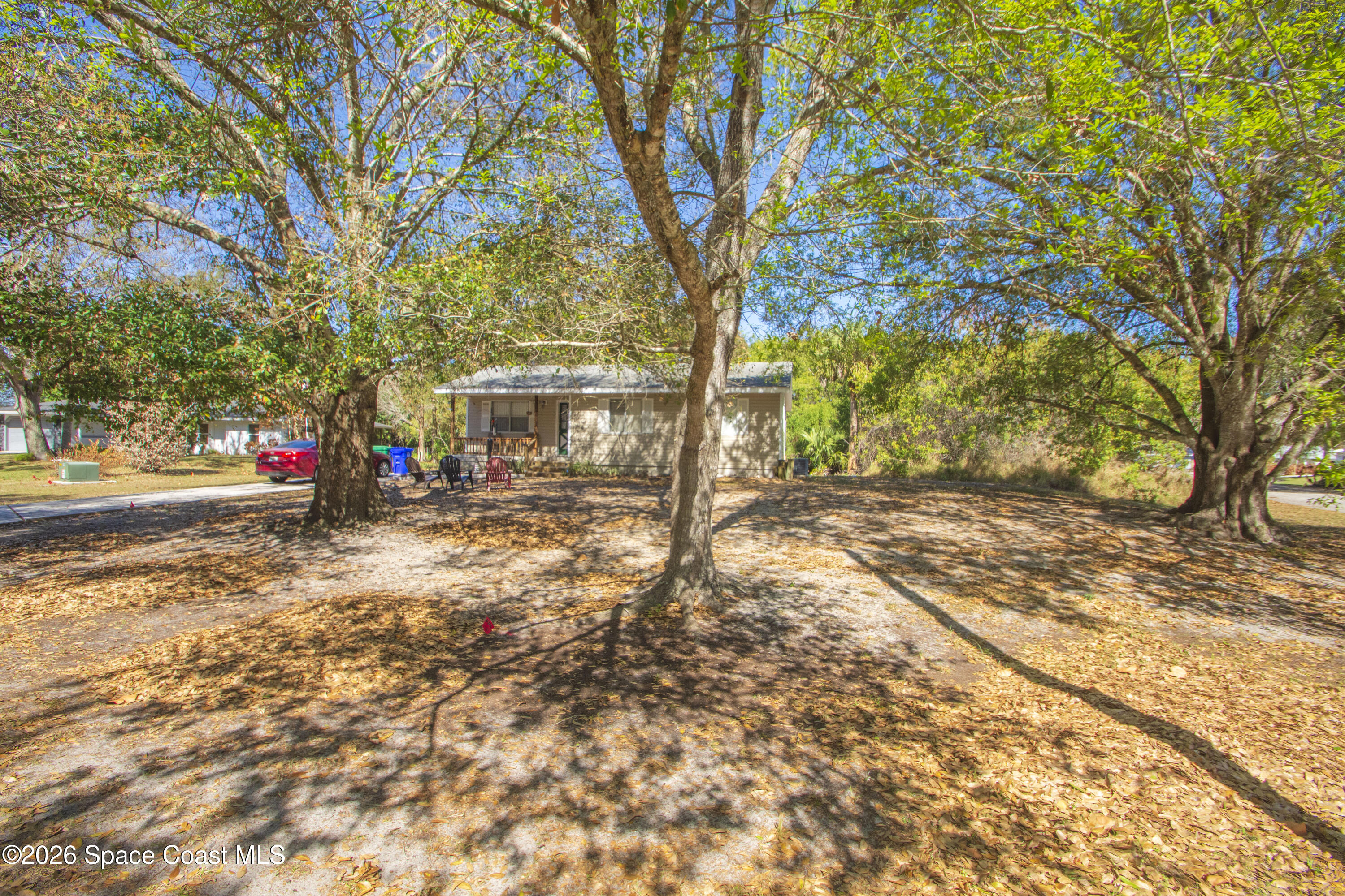117 Acorn Terrace Sebastian, FL 32958 - Photo 10 of 33 a view of road with trees