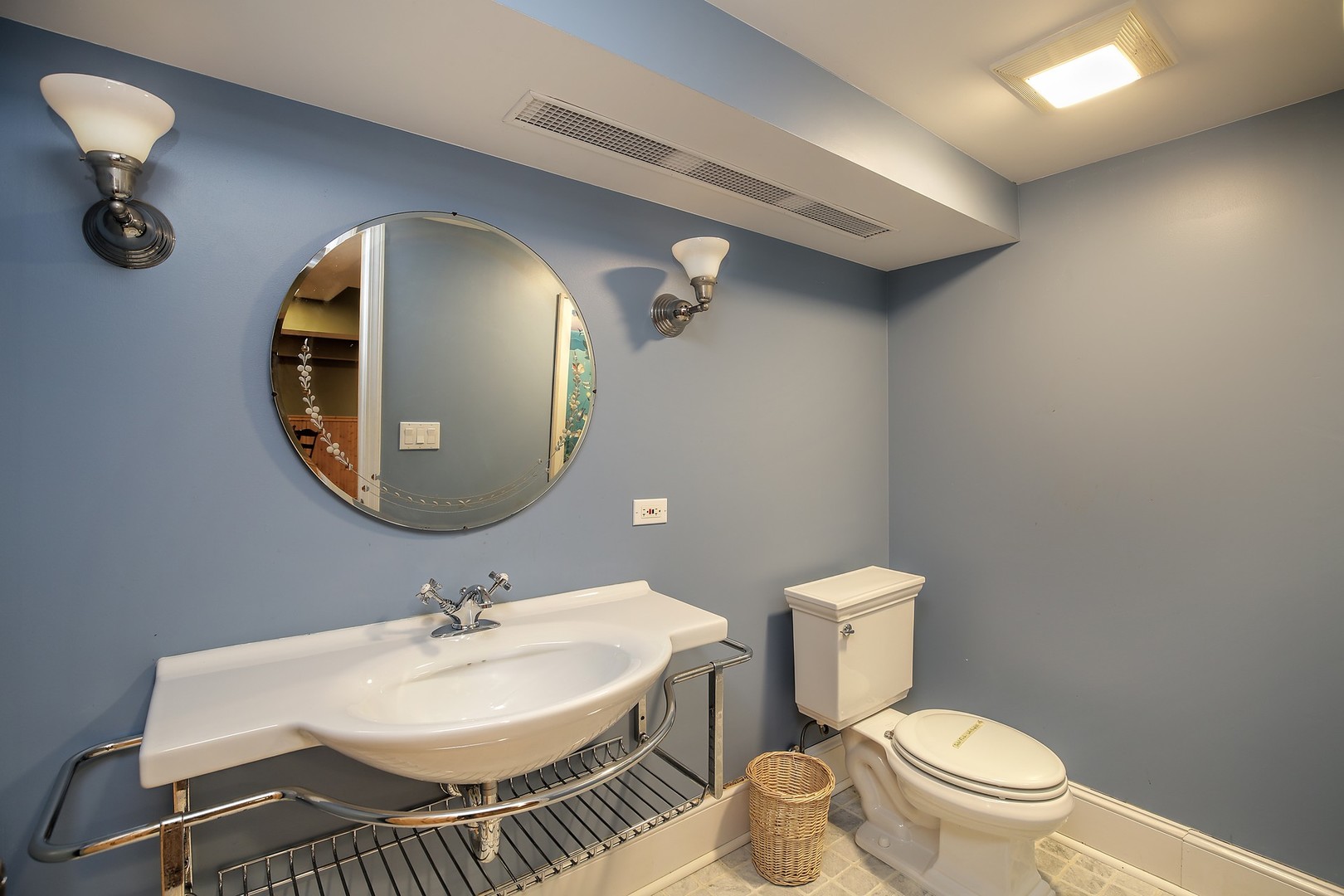 2849 Shannon Road Northbrook, IL 60062 - Photo 22 of 30 a bathroom with a sink and a mirror