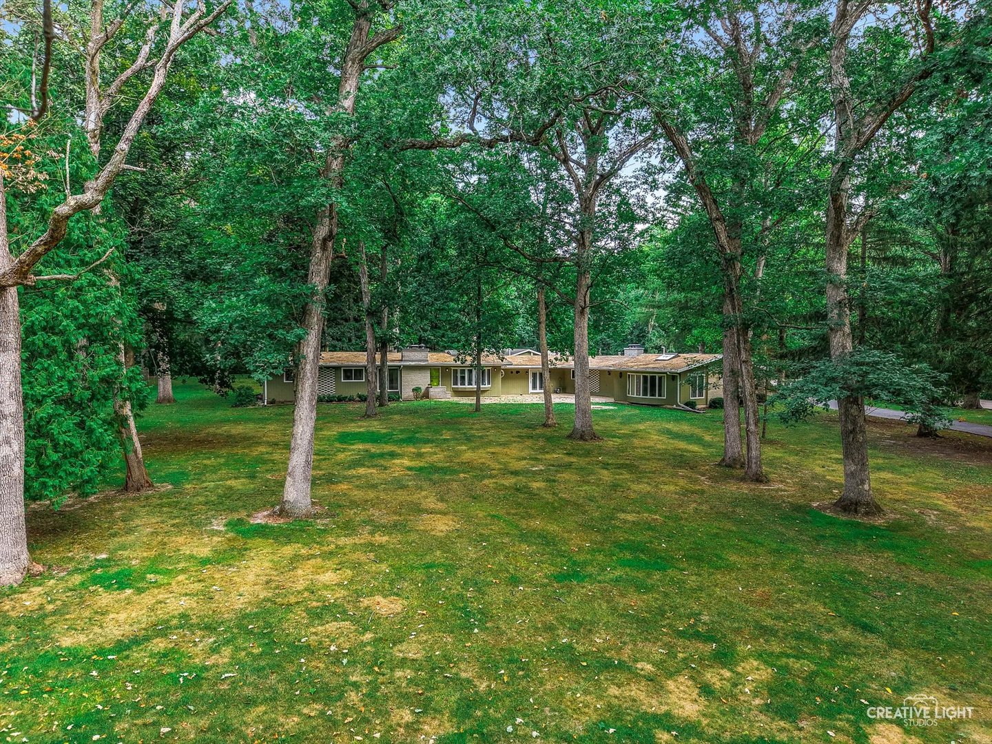 16323 Griswold Springs Road Plano, IL 60545 - Photo 2 of 55 a view of a park with a tree