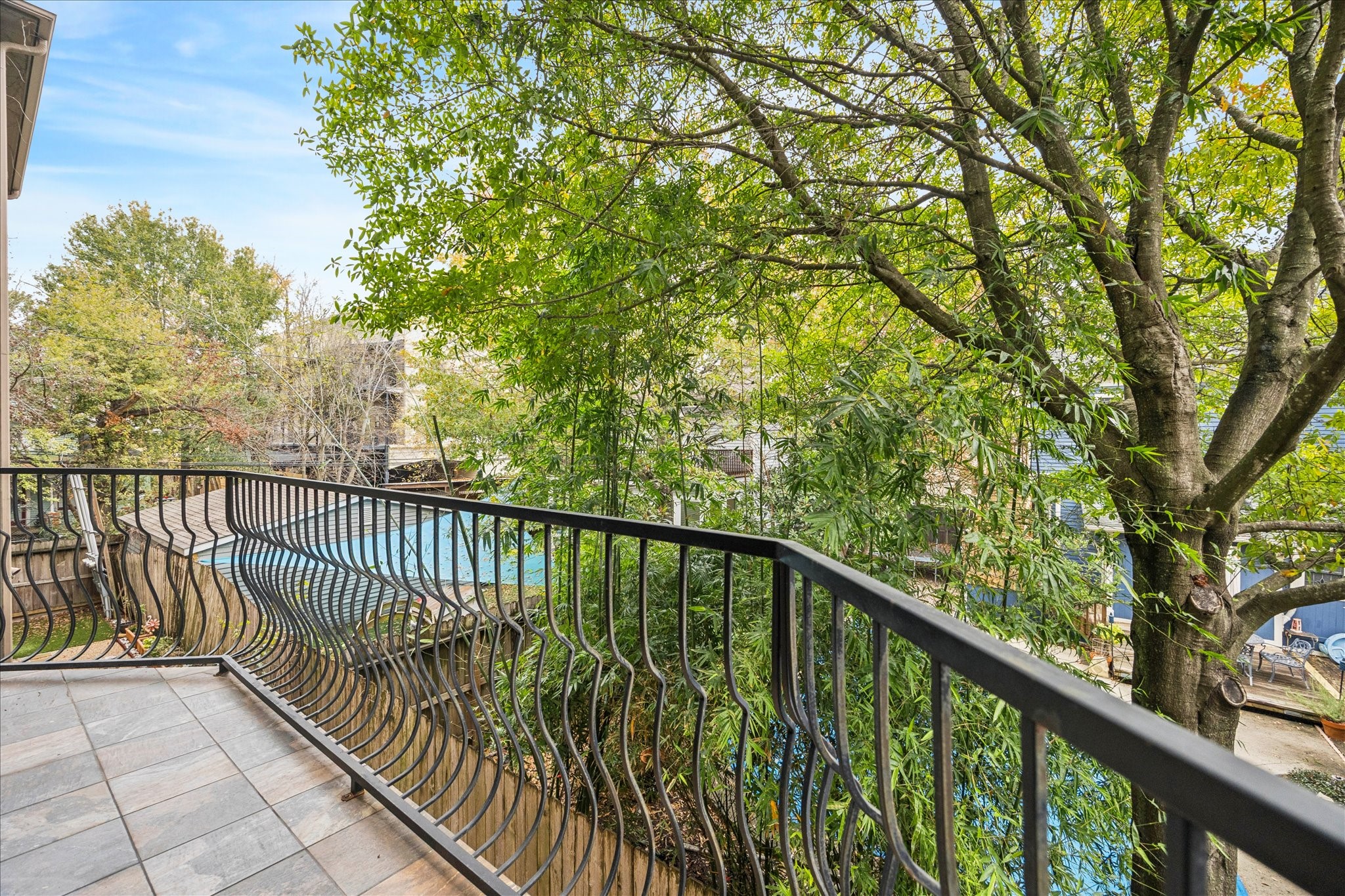 4418 Rose Street Houston, TX 77007 - Photo 12 of 34 Kitchen level balcony offering a quiet outdoor space with easy indoor access.