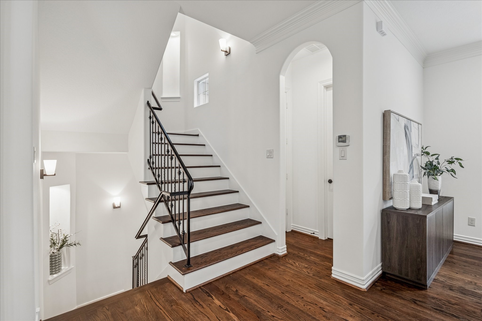 4418 Rose Street Houston, TX 77007 - Photo 18 of 34 a view of entryway with wooden floor and stairs