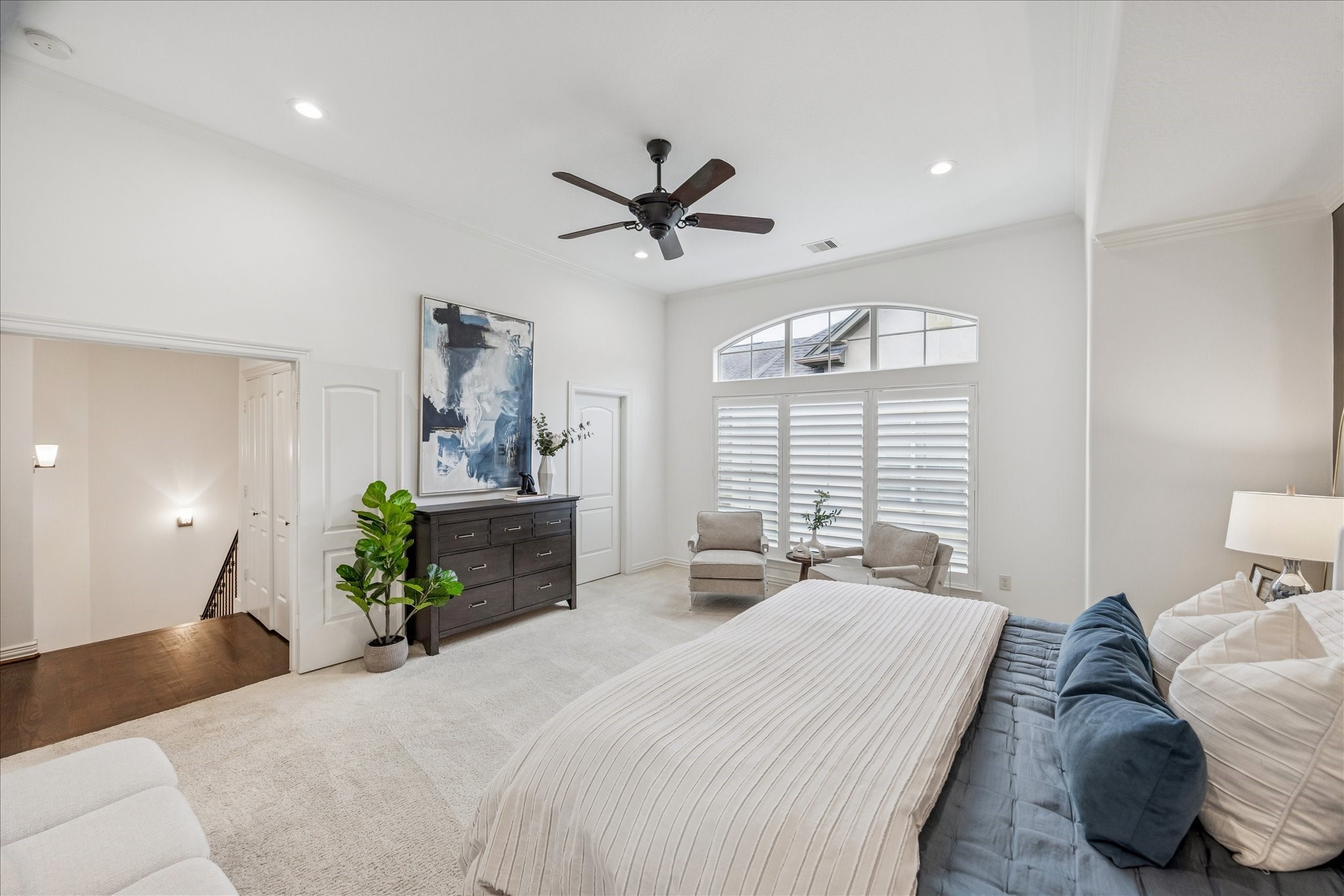 4418 Rose Street Houston, TX 77007 - Photo 25 of 34 a bedroom with a bed chandelier and a window