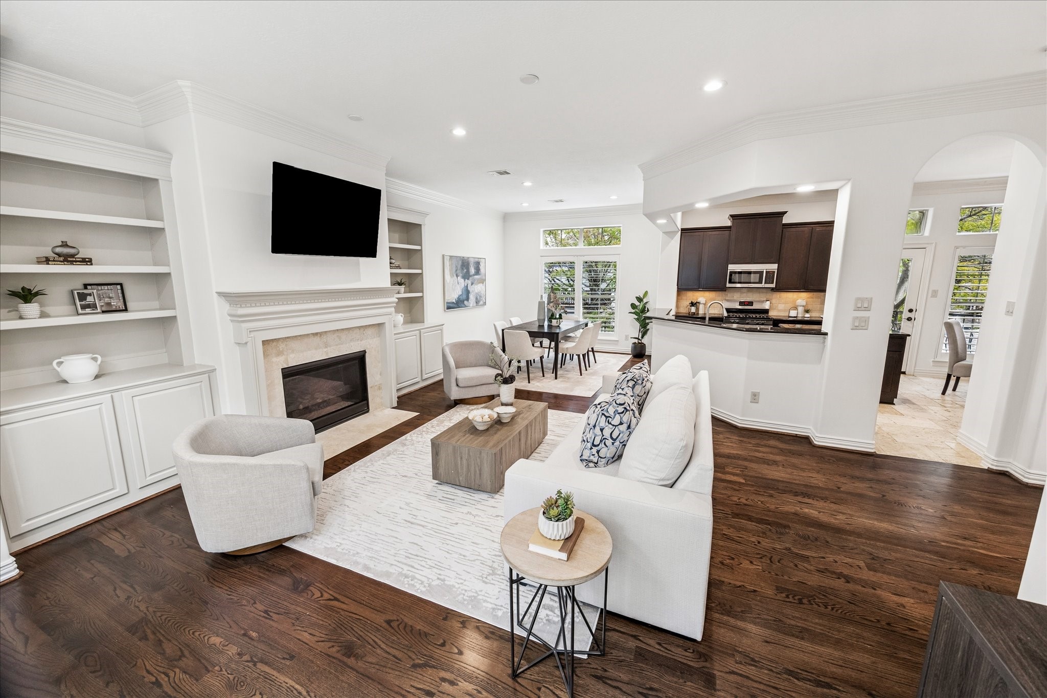 4418 Rose Street Houston, TX 77007 - Photo 7 of 34 Seamless connection between living, dining, and kitchen spaces for easy entertaining.