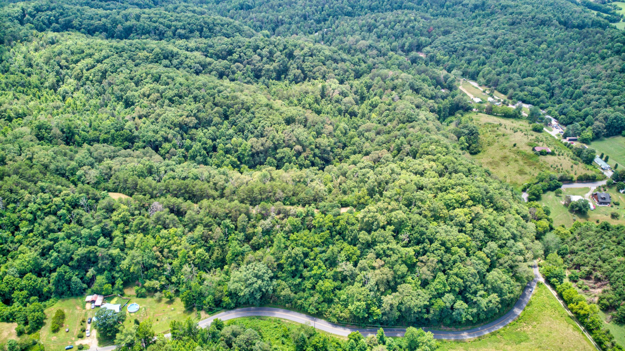 0 Sharp Road Sevierville, TN 37876 - Photo 9 of 27 an aerial view of residential house with outdoor space and trees all around