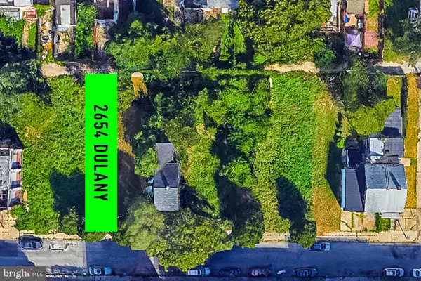 an aerial view of a house with a garden