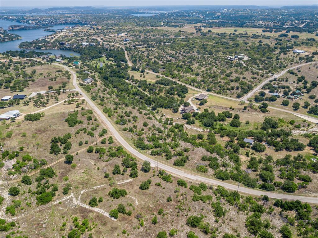 8021 Hells Gate Loop Strawn, TX 76475 - Photo 34 of 39 Birds eye view of property with a water view