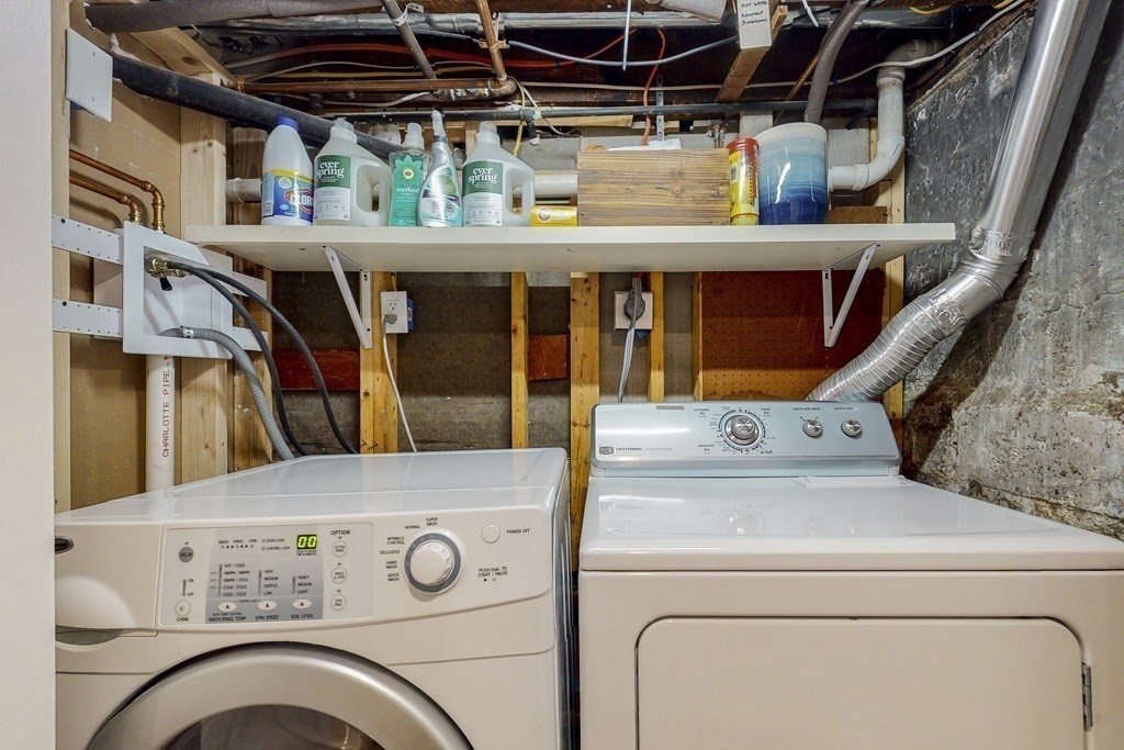 15 Sunset Road, Unit 15 Watertown, MA 02472 - Photo 18 of 22 a utility room with dryer and washer