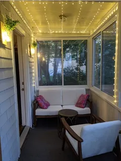 a view of a house with a yard and plants