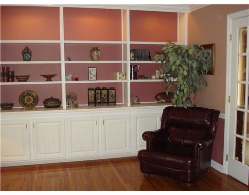336 South Ritter Sewickley, PA 15143 - Photo 4 of 17 Den. GLEAMING HARDWOOD FLOORS AND CUSTOM BUILT SHELVES & CUPBOARDS HIGHLIGHT THE DEN.