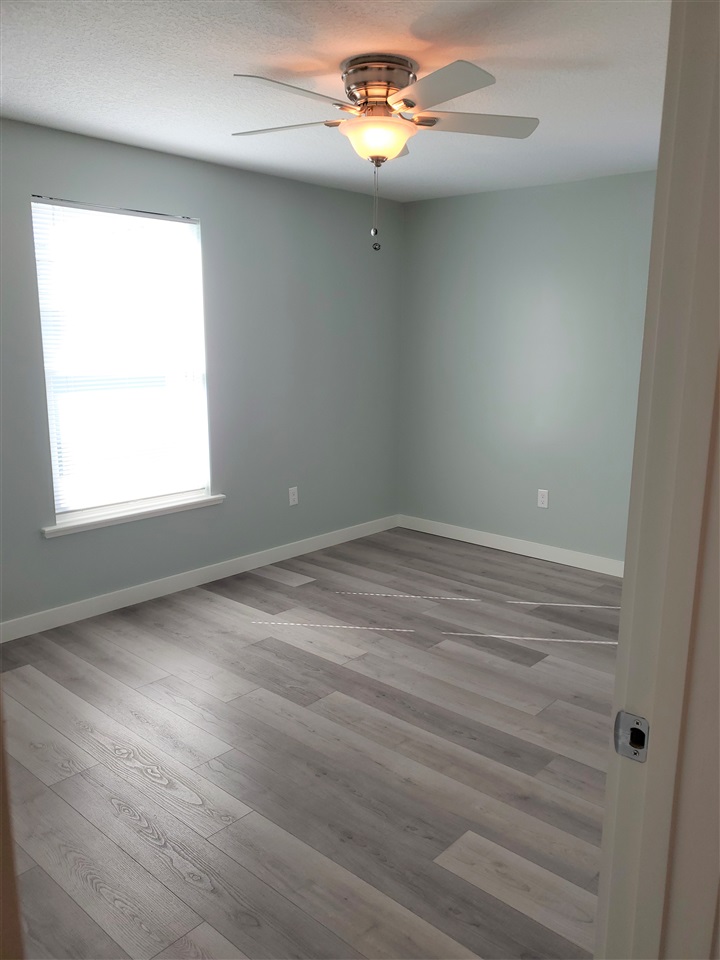 105 Beachcomber Way, Unit B St. Augustine, FL 32084 - Photo 12 of 14 an empty room with a window