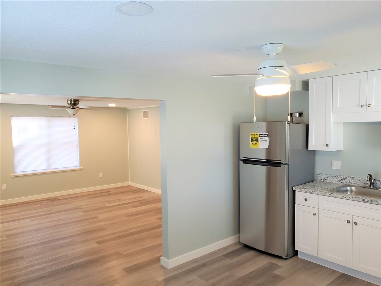 105 Beachcomber Way, Unit B St. Augustine, FL 32084 - Photo 5 of 14 a view of a kitchen with a closet and electronic appliances