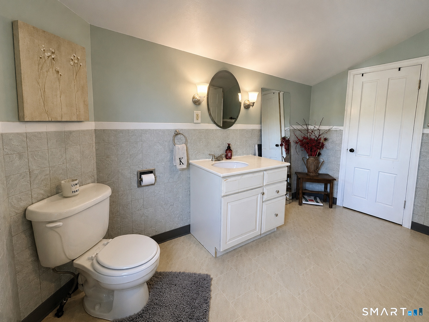 443 Amity Road Bethany, CT 06524 - Photo 24 of 30 a bathroom with a toilet sink and mirror