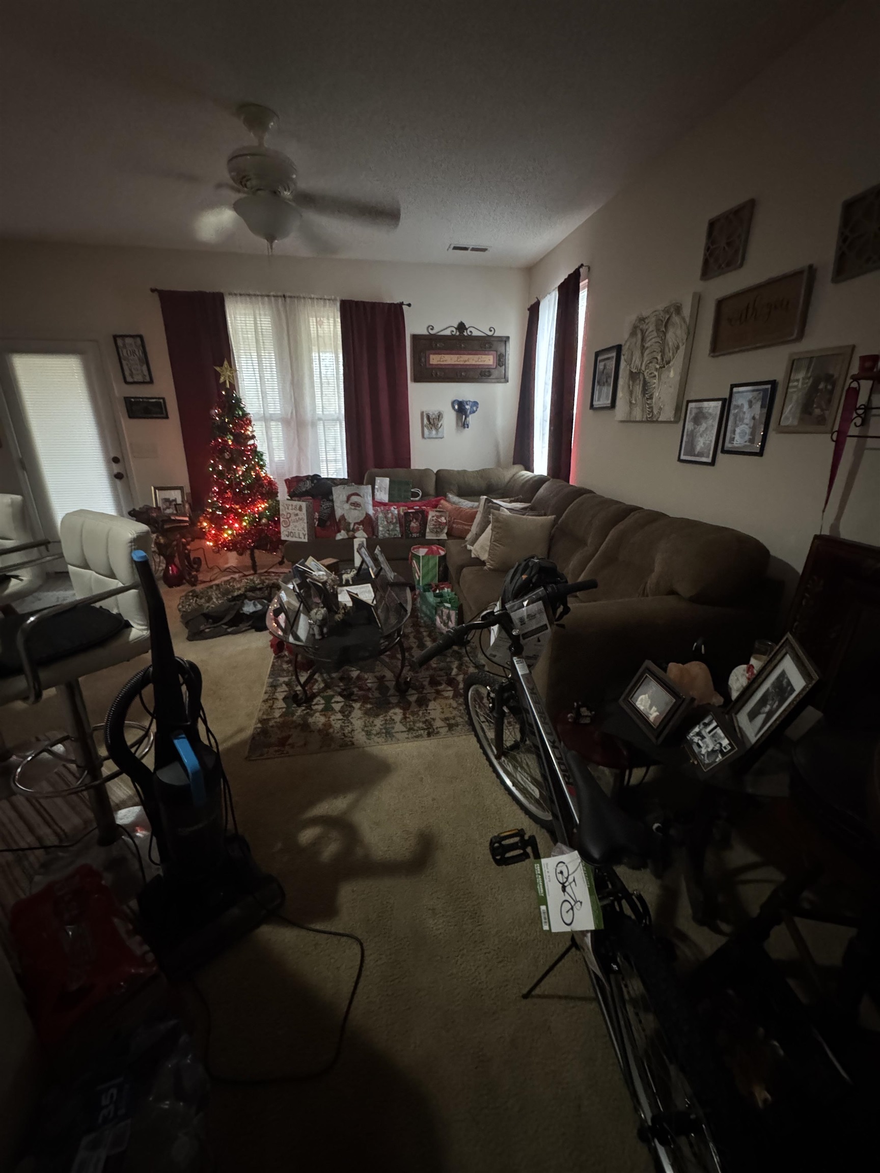 116 Olde Towne Way, Unit 6 Myrtle Beach, SC 29588 - Photo 12 of 23 Carpeted living room featuring ceiling fan