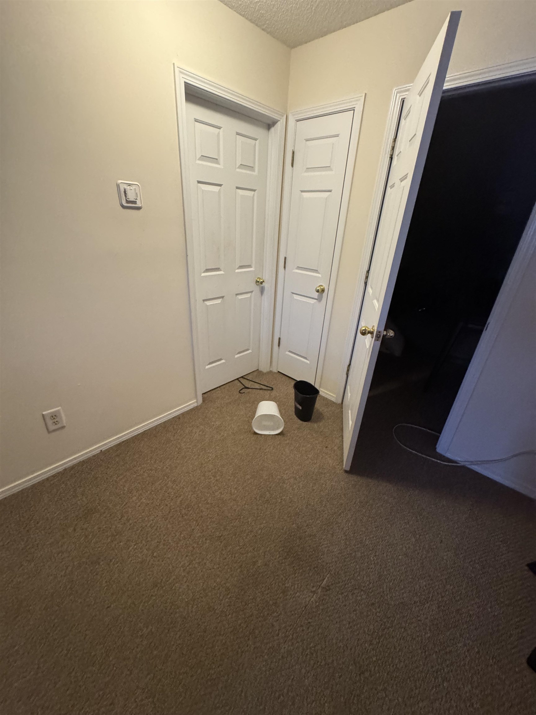 116 Olde Towne Way, Unit 6 Myrtle Beach, SC 29588 - Photo 13 of 23 Unfurnished bedroom with dark carpet and a textured ceiling