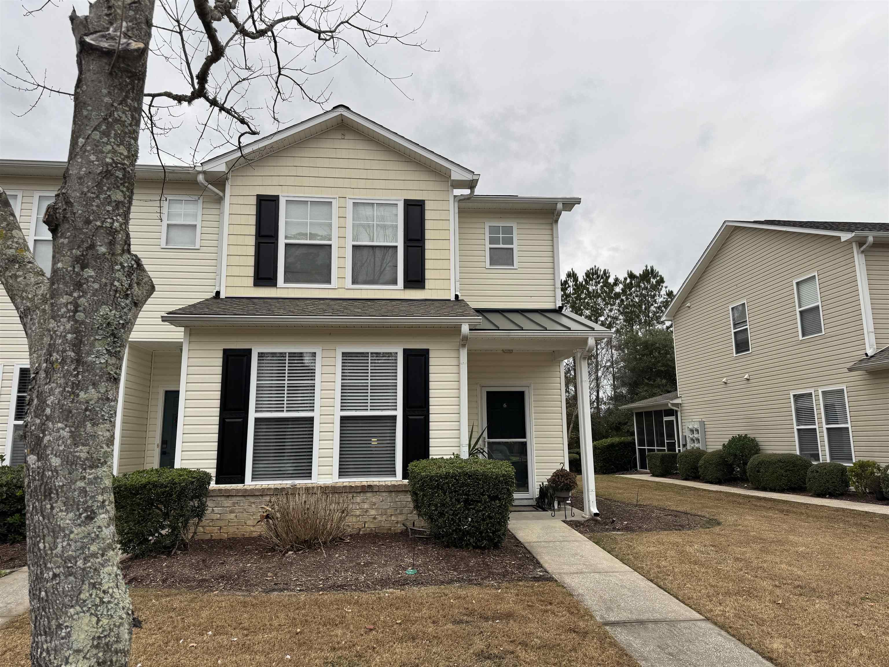 116 Olde Towne Way, Unit 6 Myrtle Beach, SC 29588 - Photo 3 of 23 Traditional home with covered porch