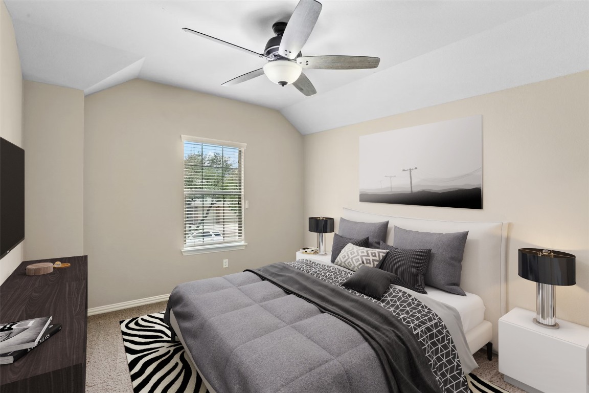 2804 Prosperity Leander, TX 78641 - Photo 30 of 39 Bedroom with carpet flooring, a ceiling fan, and vaulted ceiling