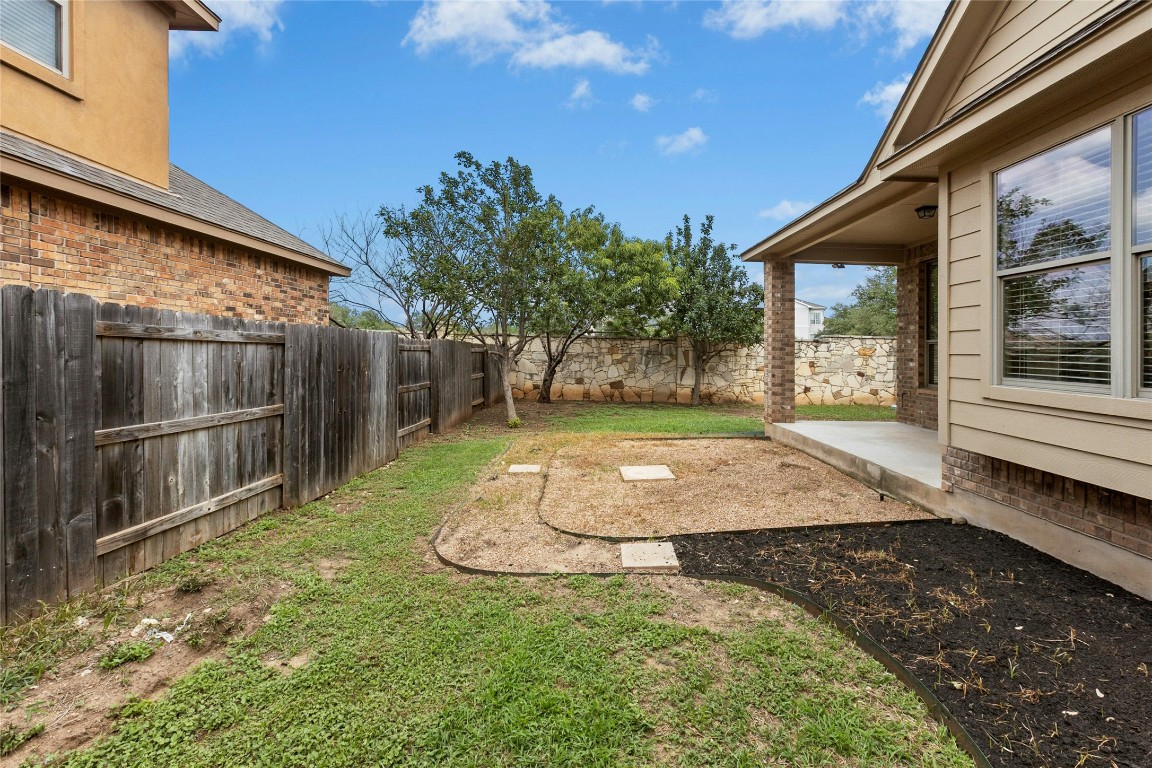 2804 Prosperity Leander, TX 78641 - Photo 35 of 39 View of yard featuring a patio