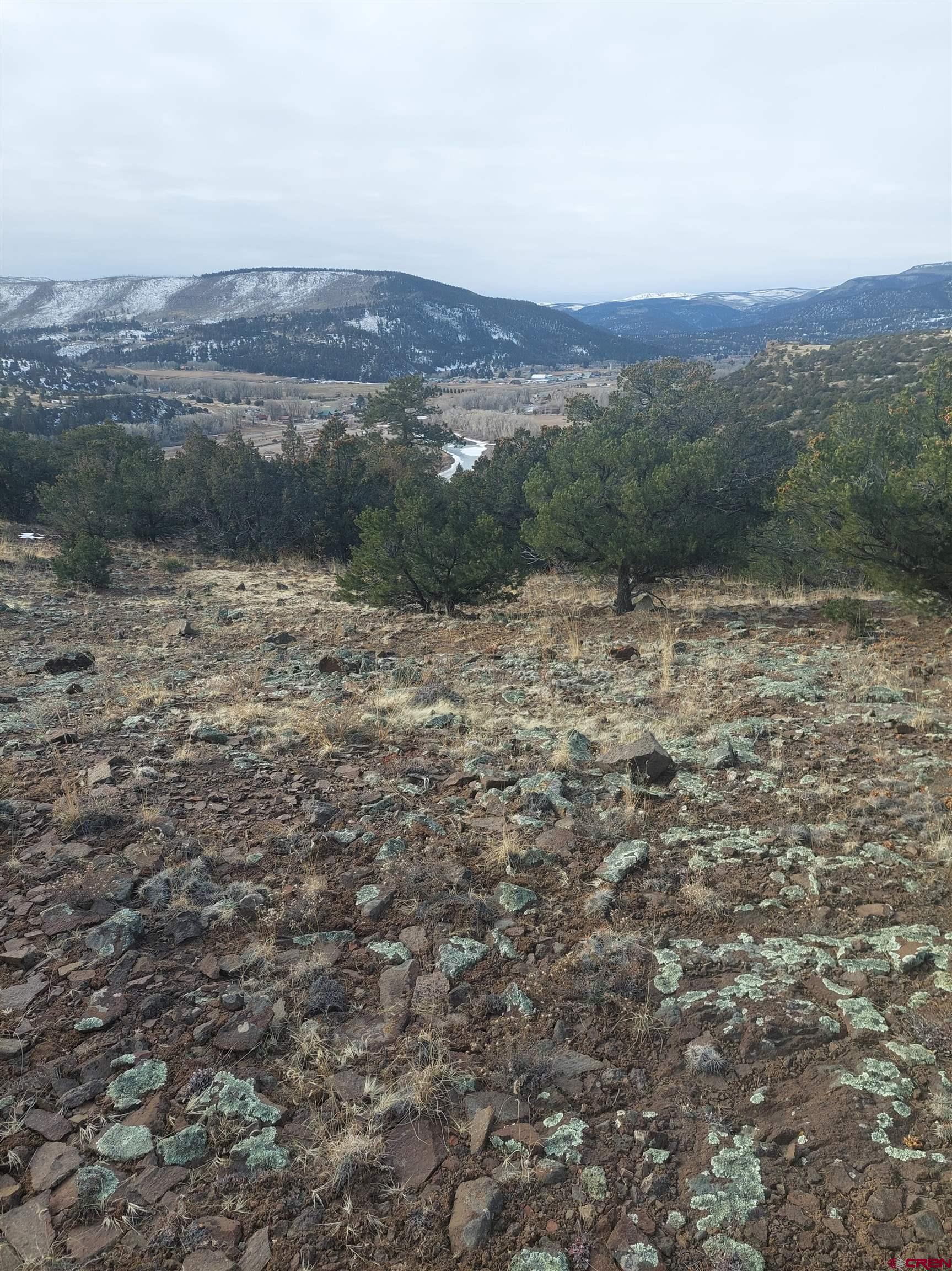 119 Cactus Road South Fork, CO 81154 - Photo 5 of 7 a view of a lake with mountains in the background