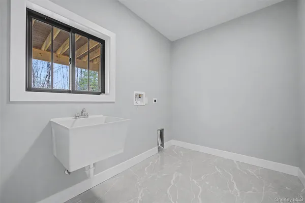 a bathroom with a sink and a bathtub