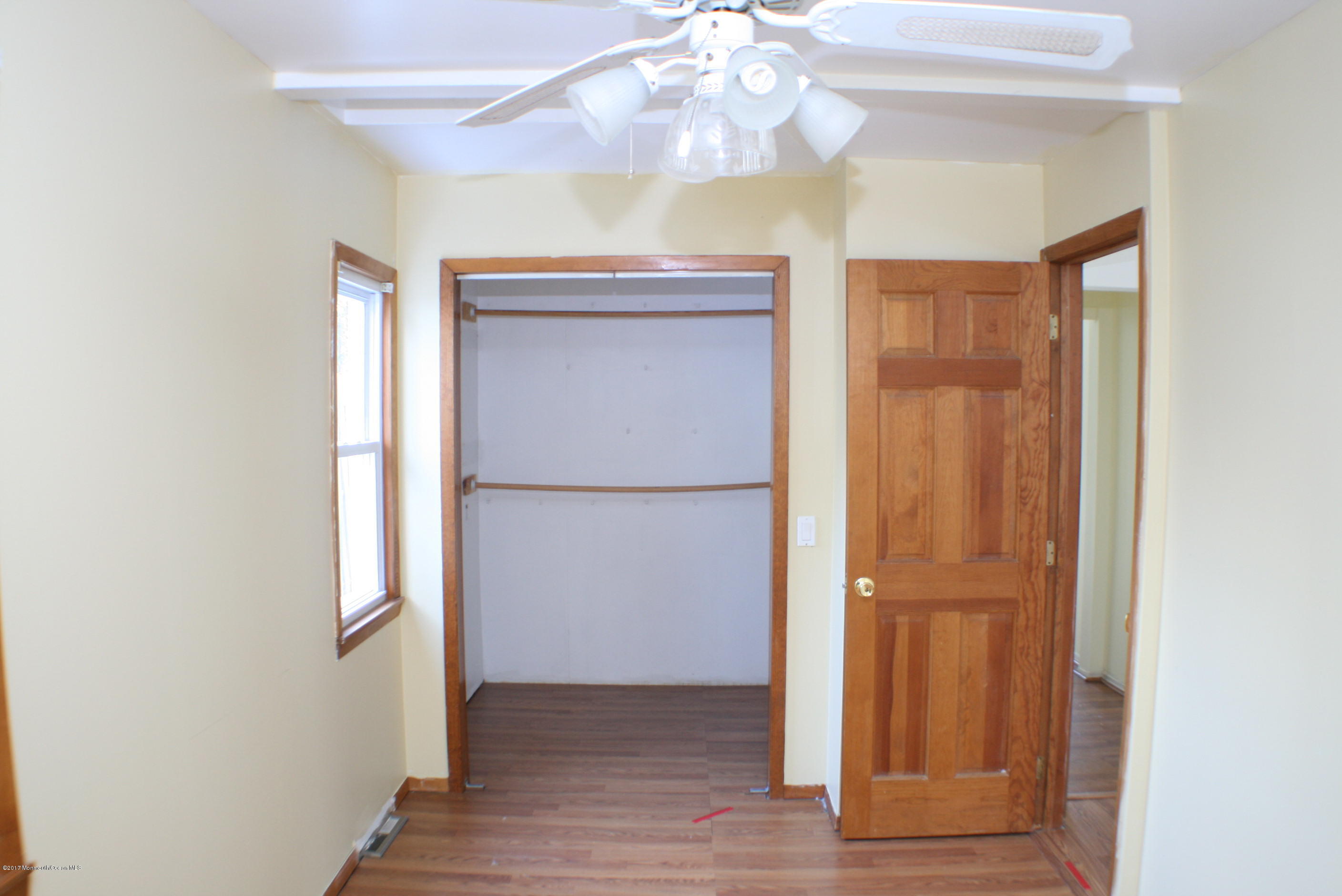 73 Breton Road Brick, NJ 08723 - Photo 17 of 40 a view of an entryway with wooden floor