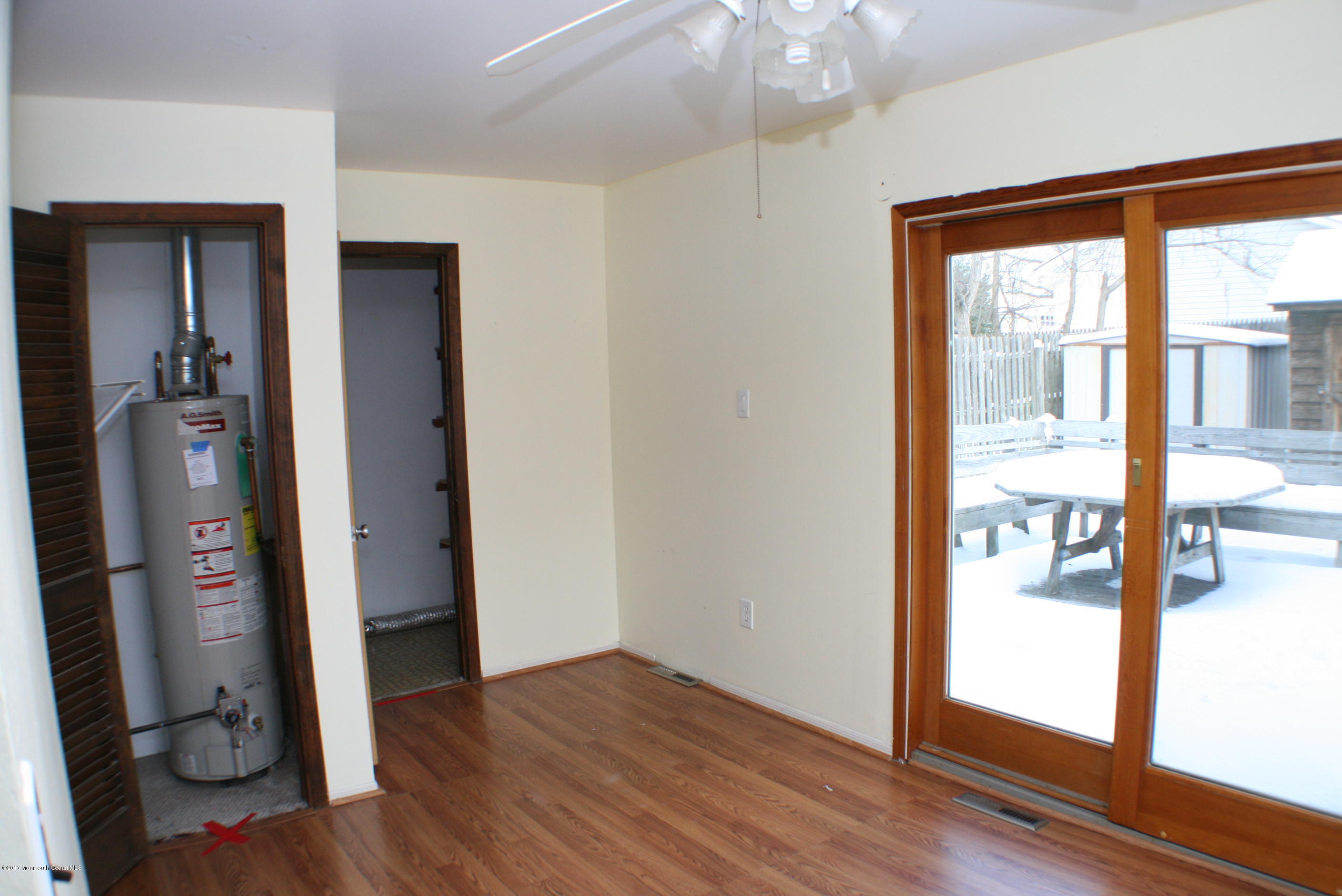 73 Breton Road Brick, NJ 08723 - Photo 27 of 40 wooden floor in an empty room with a window