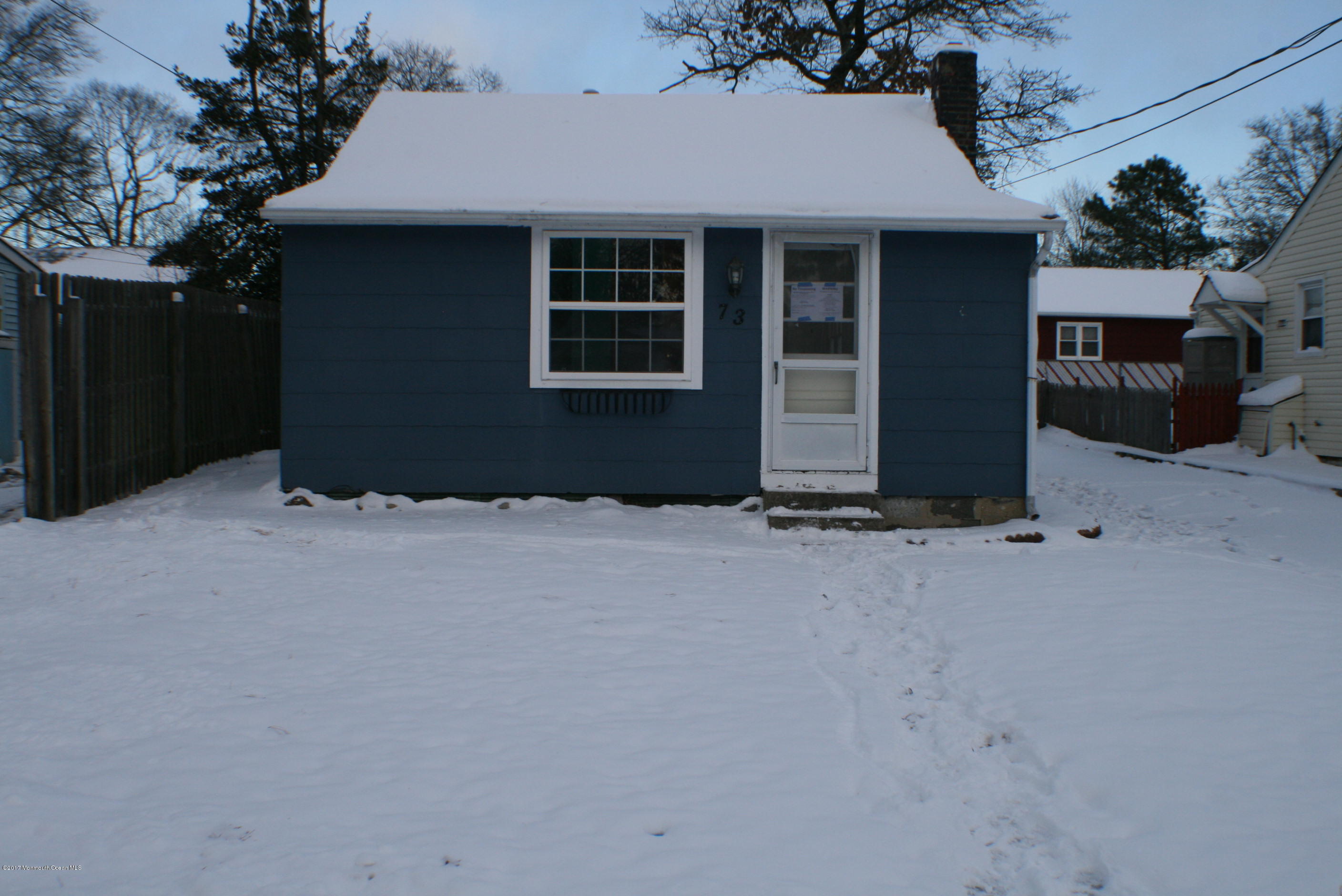 73 Breton Road Brick, NJ 08723 - Photo 3 of 40 a front view of a house with a yard