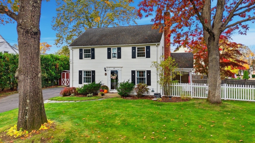 42 Redstone Drive Springfield, MA 01118 - Photo 1 of 37 a front view of a house with garden