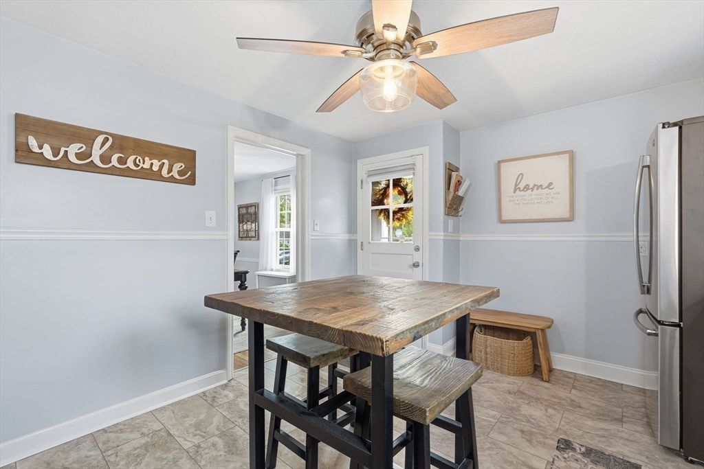 42 Redstone Drive Springfield, MA 01118 - Photo 13 of 37 a view of a dining room with furniture