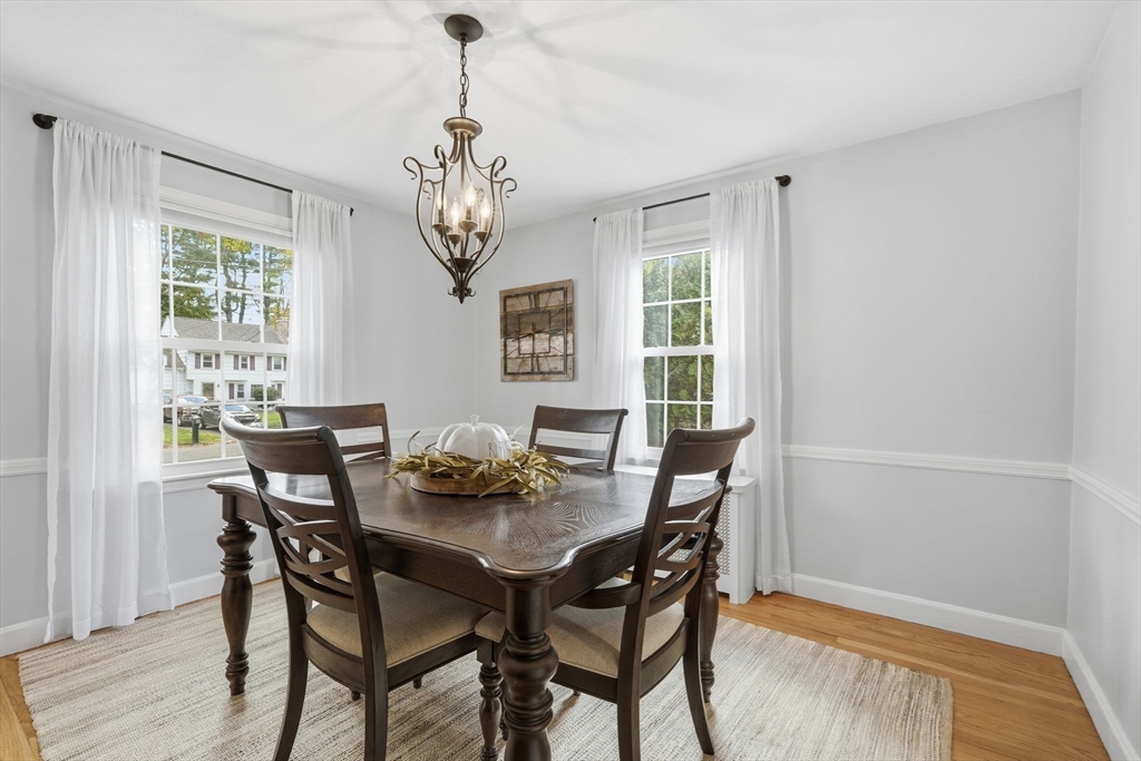 42 Redstone Drive Springfield, MA 01118 - Photo 15 of 37 a view of a dining room with furniture window and wooden floor