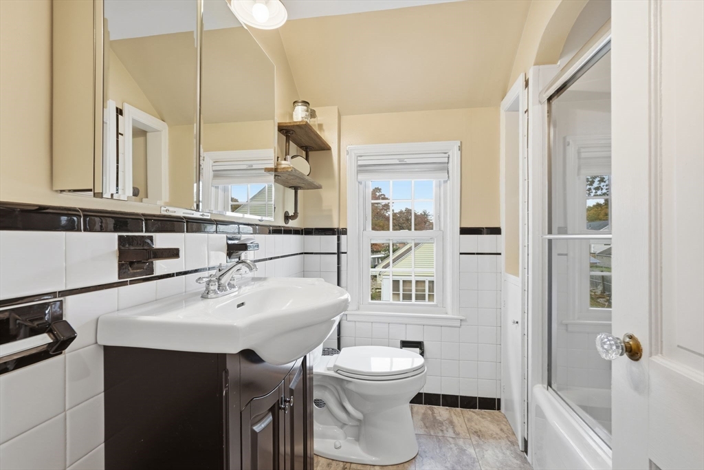 42 Redstone Drive Springfield, MA 01118 - Photo 21 of 37 a bathroom with a sink a toilet and shower