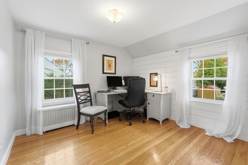 42 Redstone Drive Springfield, MA 01118 - Photo 23 of 37 a view of a workspace with furniture and a window