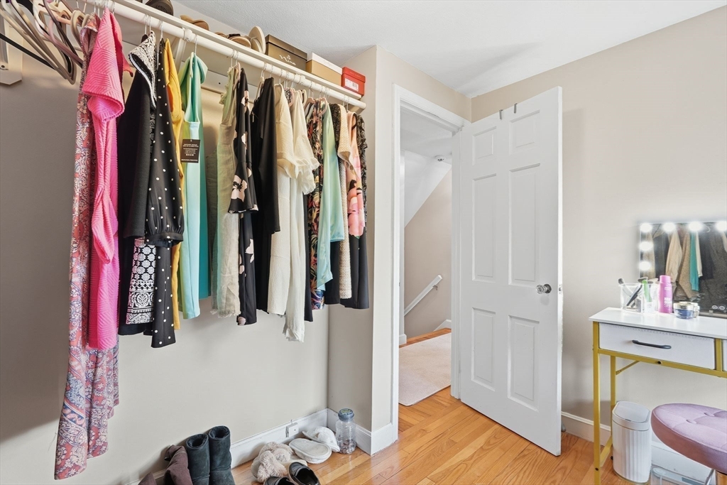 42 Redstone Drive Springfield, MA 01118 - Photo 26 of 37 a view of walk in closet with clothes and shoes