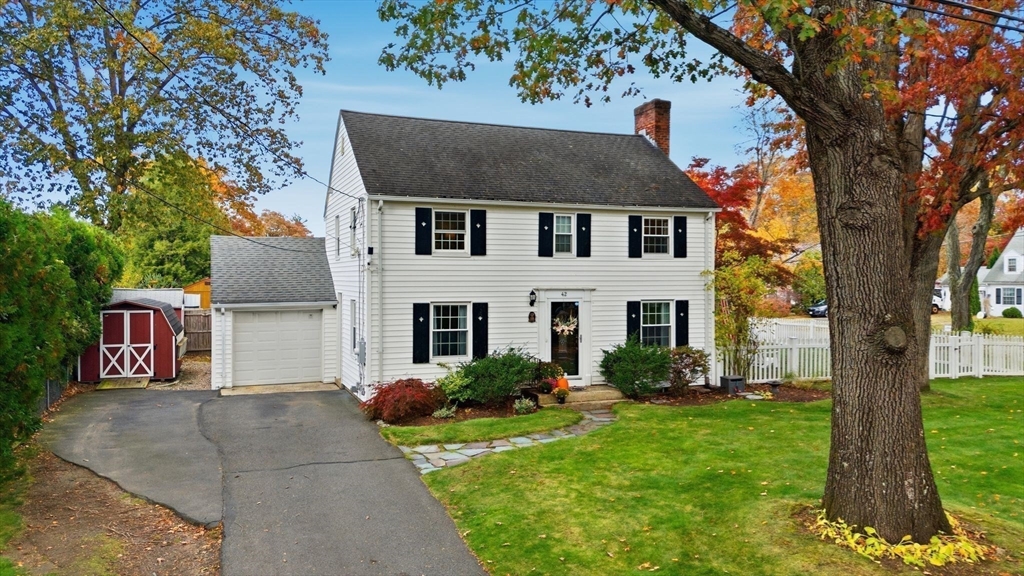 42 Redstone Drive Springfield, MA 01118 - Photo 37 of 37 a front view of a house with garden