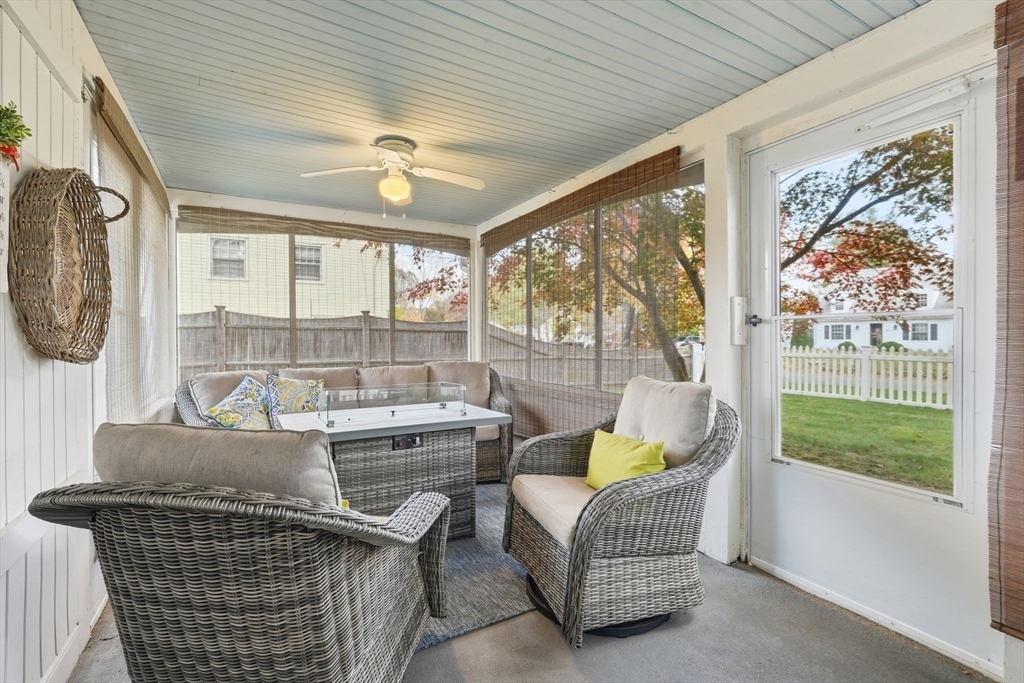 42 Redstone Drive Springfield, MA 01118 - Photo 9 of 37 a living room with furniture and a large window