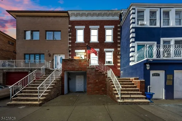 a front view of a house with a balcony