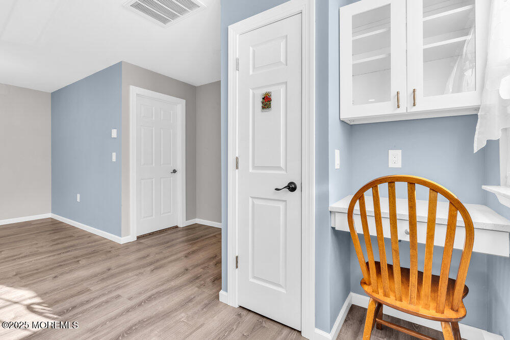 69 D Sunset Road, Unit 60 Whiting, NJ 08759 - Photo 9 of 19 a view of an entryway with wooden floor