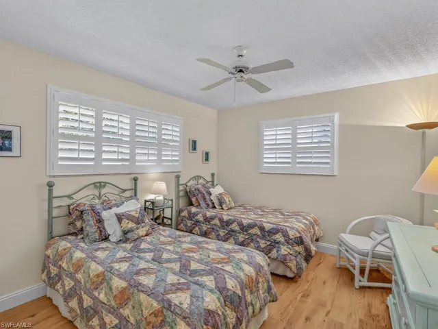 a patio with a patio table and chairs