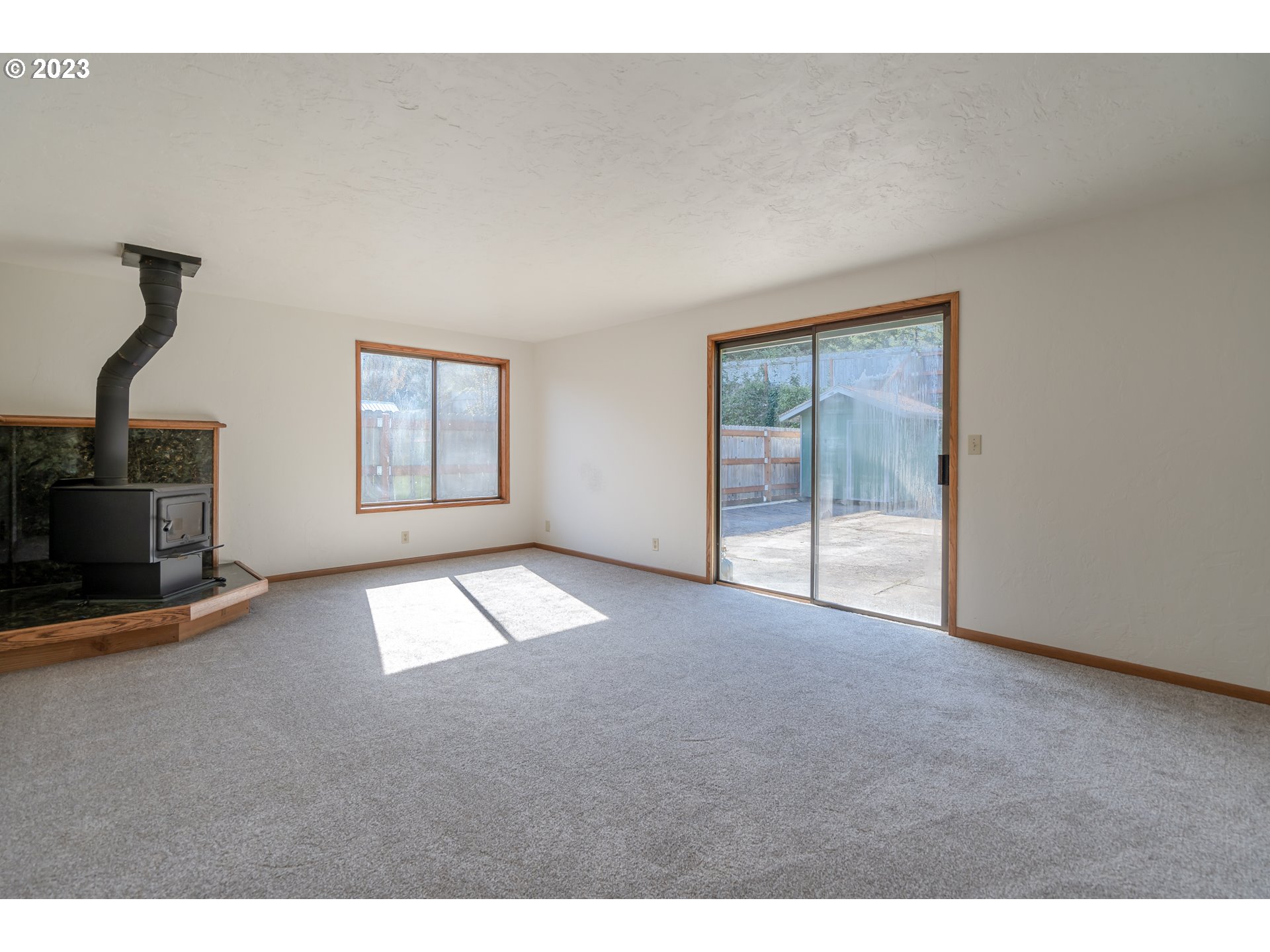 7441 A Street Springfield, OR 97478 - Photo 12 of 25 a view of empty room with floor to ceiling window