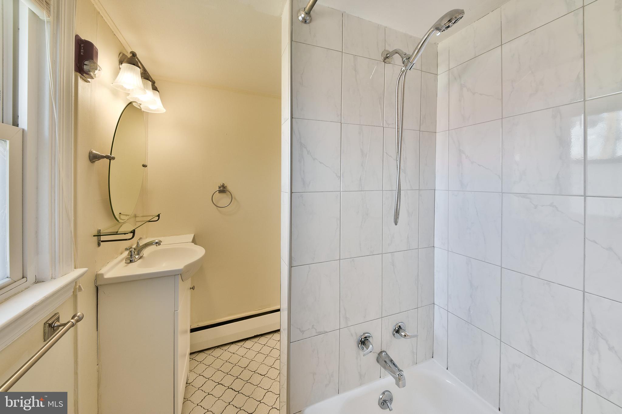 456 North Easton Road Glenside, PA 19038 - Photo 13 of 18 Master bath with tiled floor & new vanity