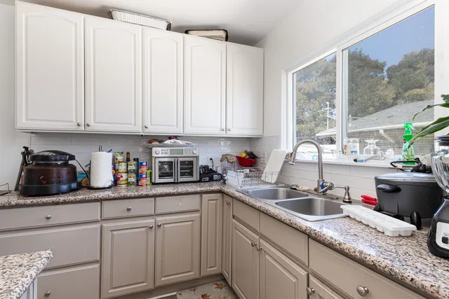 a room with furniture and a window