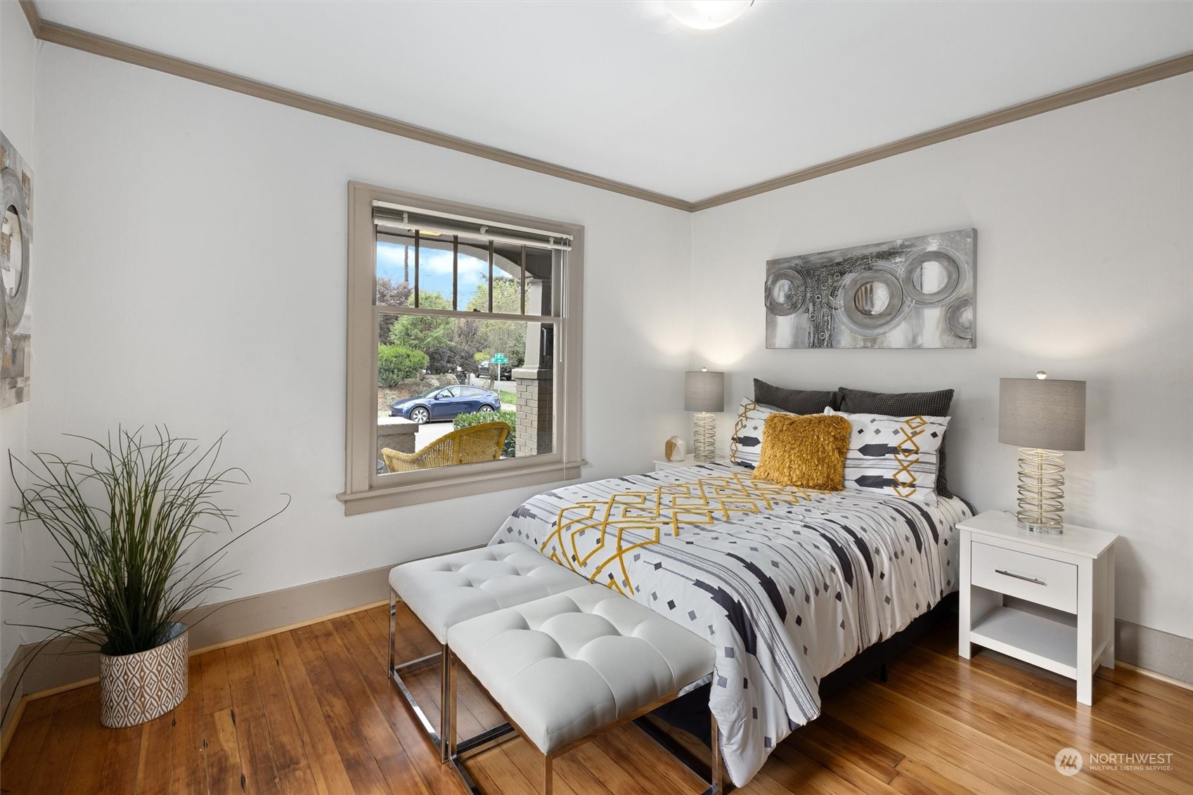 5916 8th Avenue Northeast Seattle, WA 98105 - Photo 17 of 40 a bedroom with a bed and a window