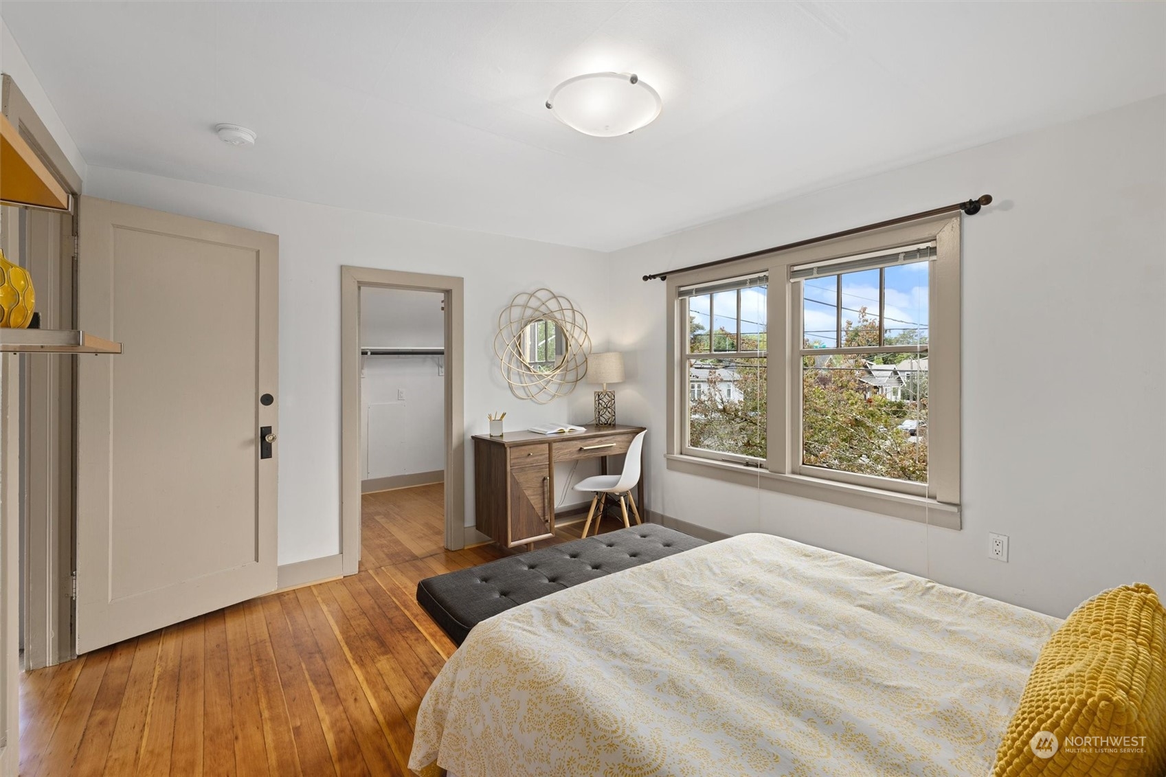5916 8th Avenue Northeast Seattle, WA 98105 - Photo 21 of 40 a bedroom with a bed and a window