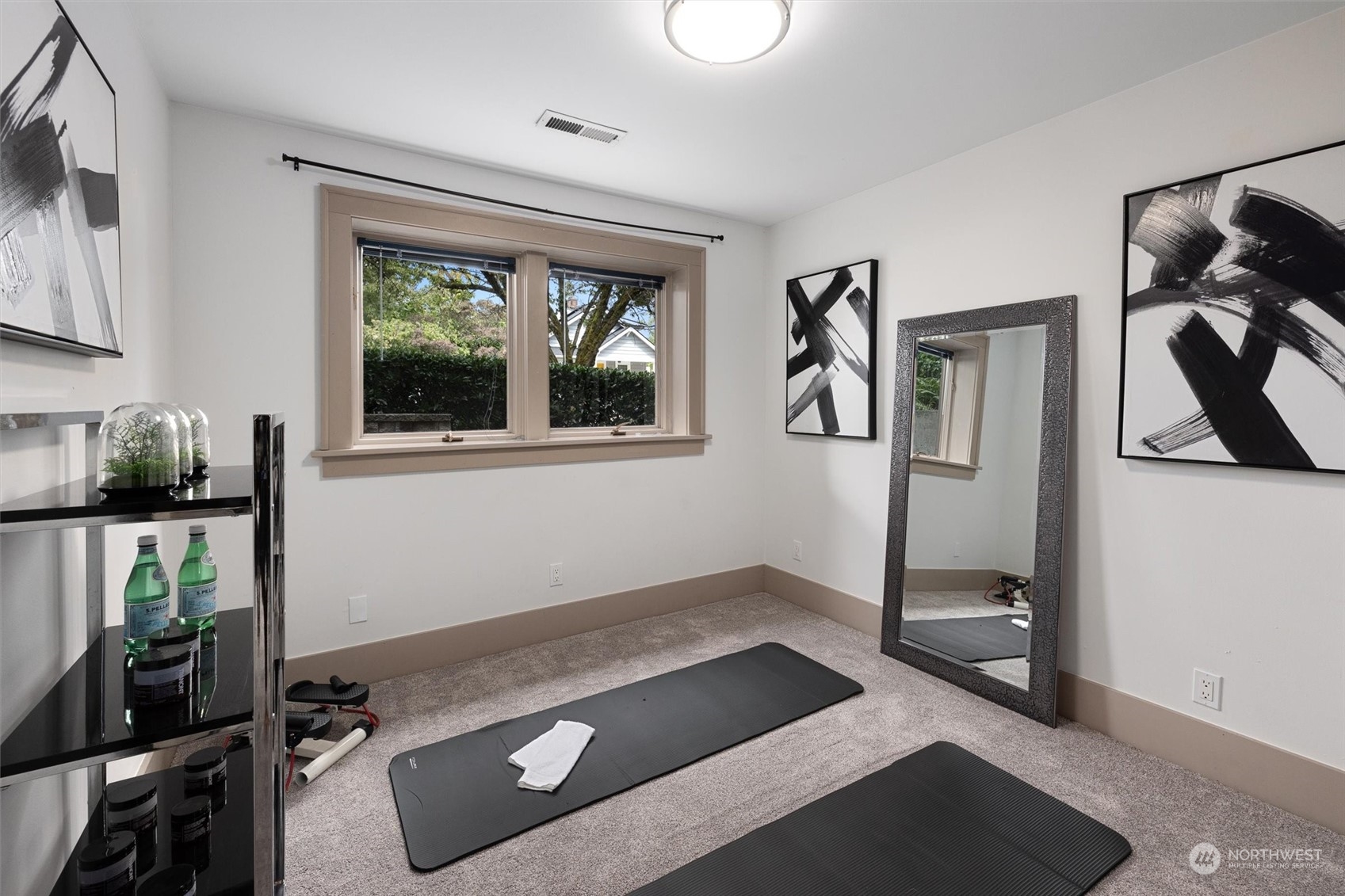 5916 8th Avenue Northeast Seattle, WA 98105 - Photo 27 of 40 a room with gym equipment and a window