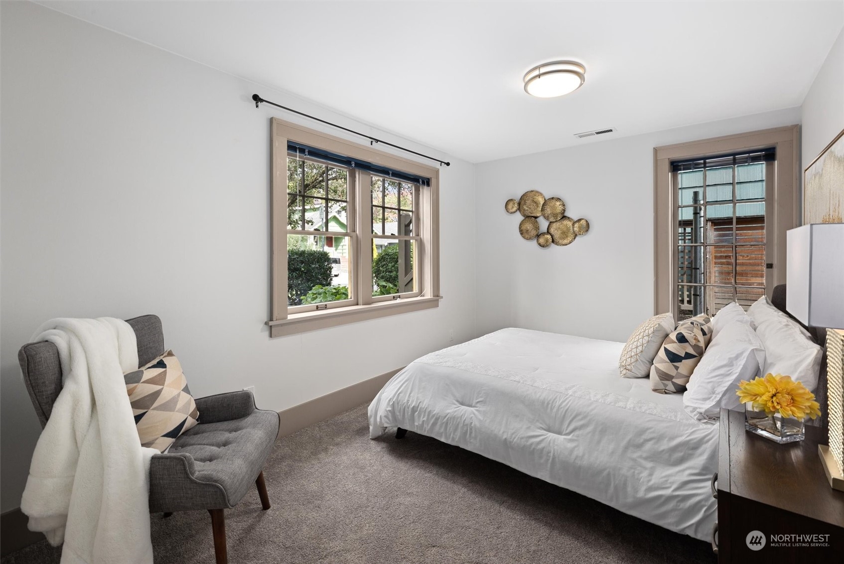 5916 8th Avenue Northeast Seattle, WA 98105 - Photo 28 of 40 a bedroom with a bed and window