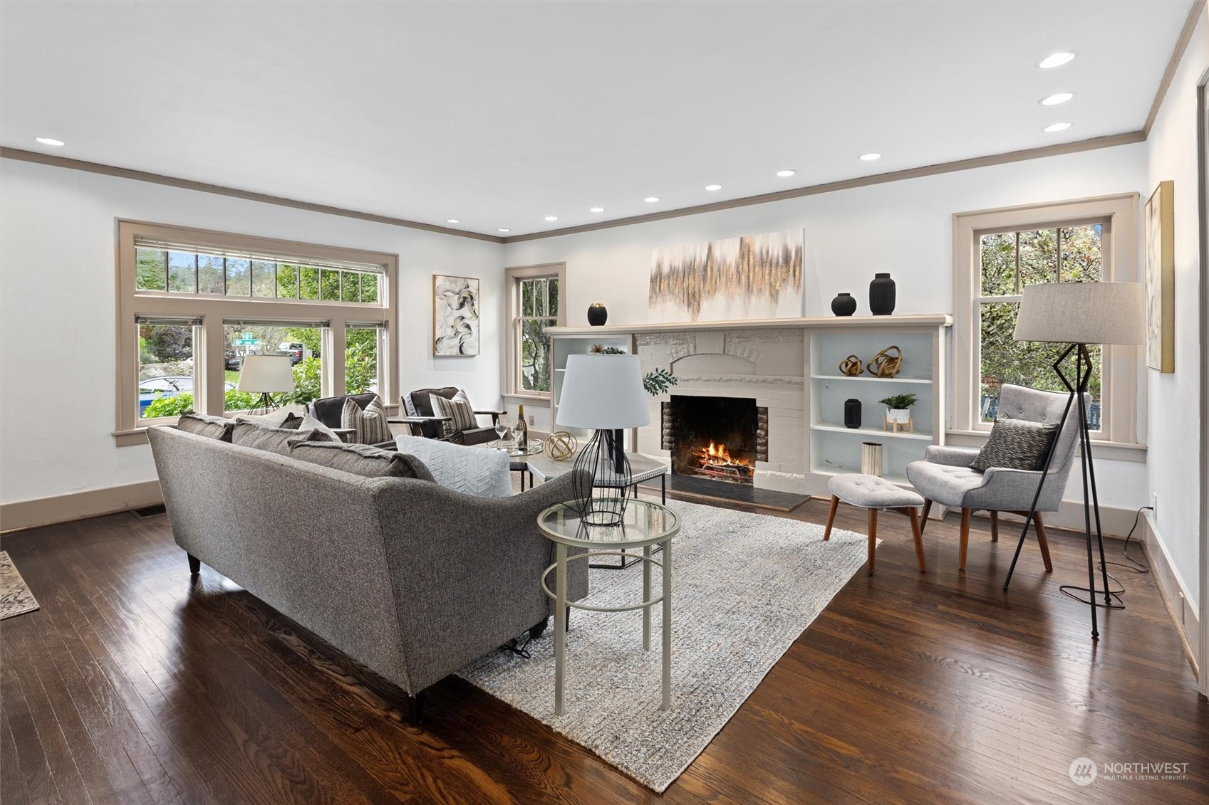 5916 8th Avenue Northeast Seattle, WA 98105 - Photo 3 of 40 a living room with furniture large window and fireplace