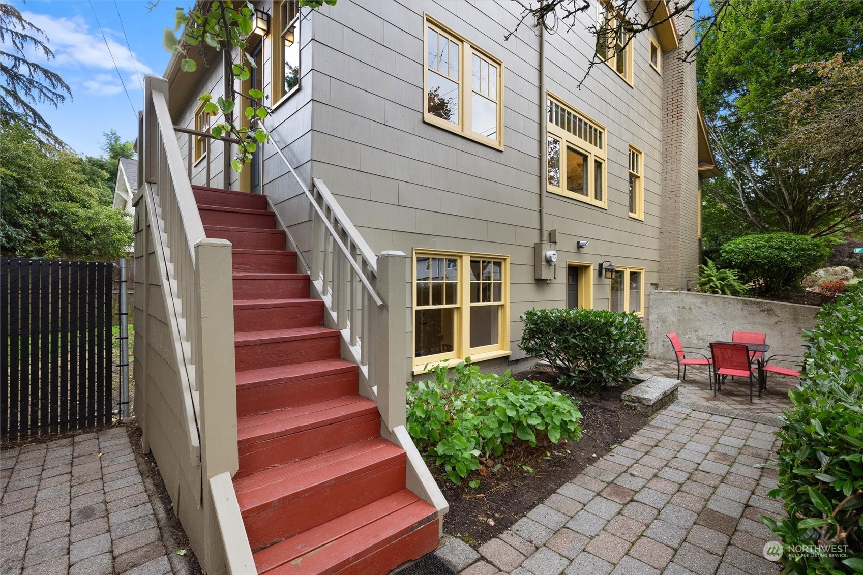 5916 8th Avenue Northeast Seattle, WA 98105 - Photo 34 of 40 a front view of a house with a yard